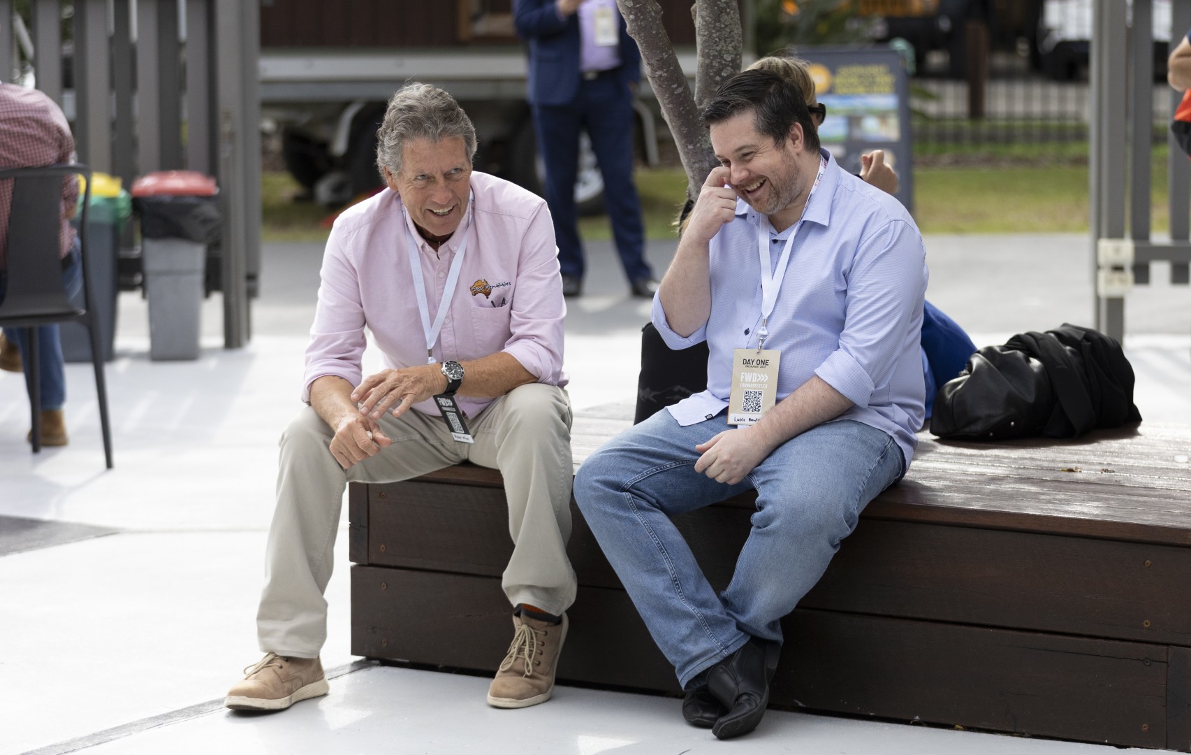 Luke Hawley in a focused marketing conversation with a local business owner