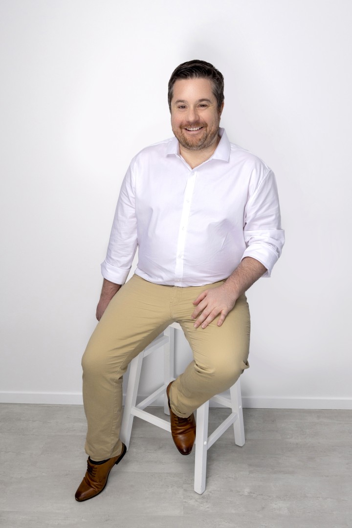 Luke Hawley seated and ready to share practical marketing advice